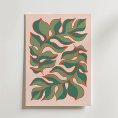 Verdant Flow Poster från Bozetto är en minimalistisk konstprint med två stora, djupgröna bladformer som är konturerade i rött och böljar inåt på en ljusrosa bakgrund - perfekt för en modern touch på en vit vägg.