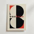 Bauhaus Abstract Typography Poster by Bozetto har svarta och röda geometriska former och modern text med små bokstäver på en ljus bakgrund, tryckt på premiumpapper med en matt finish för en raffinerad, modern stil.