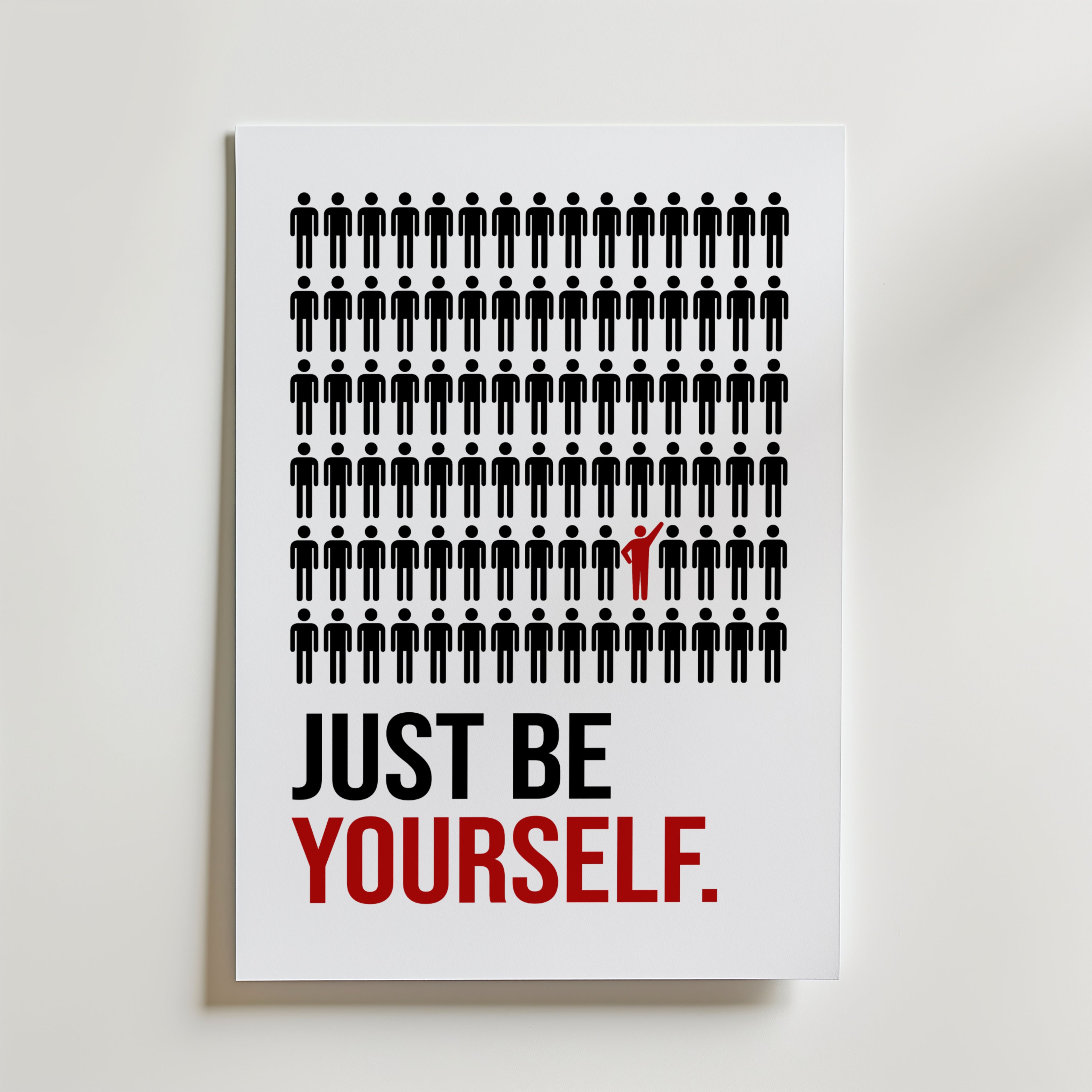 Just Be Yourself Poster – En grafisk poster med stark symbolik – en röd figur som bryter mönstret och står ut från