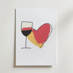 Bozetto Wine Is Love Poster föreställer ett rött och guldfyllt vinglas bredvid ett hjärta på en vit bakgrund och ger en touch av konstnärlig elegans till alla rum.